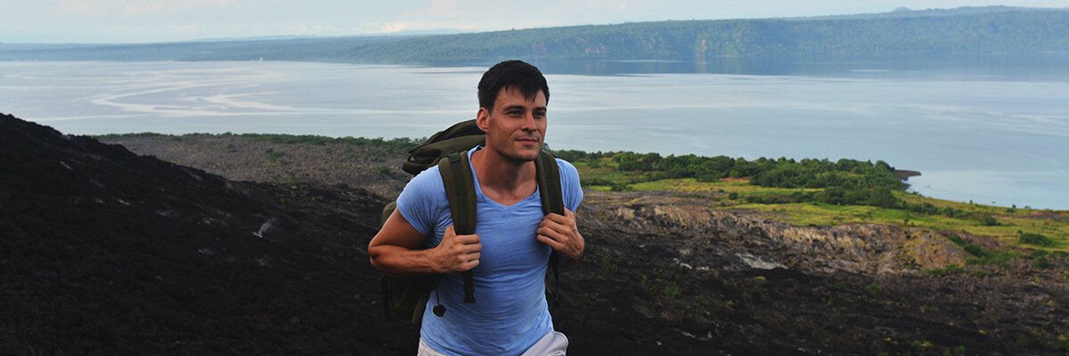 Dan hikes across the base of a volcano